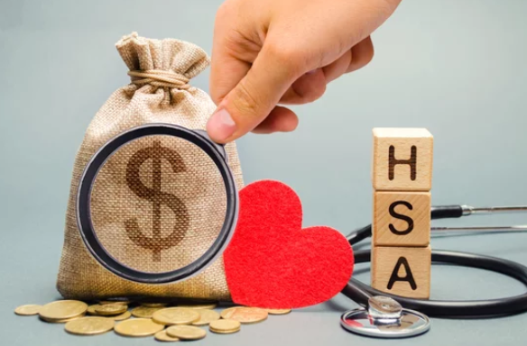 HSA letters on wooden cubes and a fund bag
