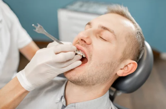 a man visiting the dentist
