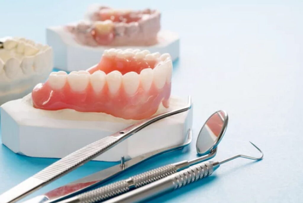 dentist's tool and teeth models