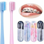blue and pink toothbrushes