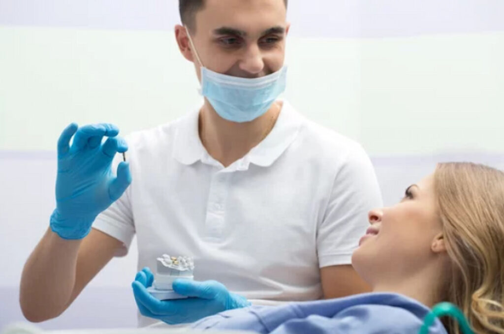 the dentist explainin options to his patient