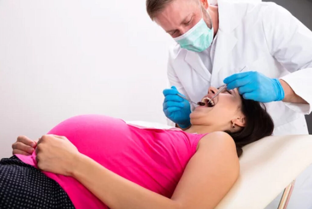 a pregnant woman on dental exam