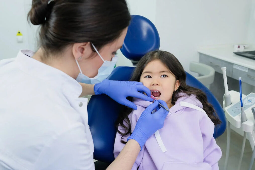 a little girl visiting the dentist