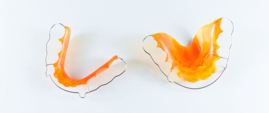 a pair of retainers on the light background