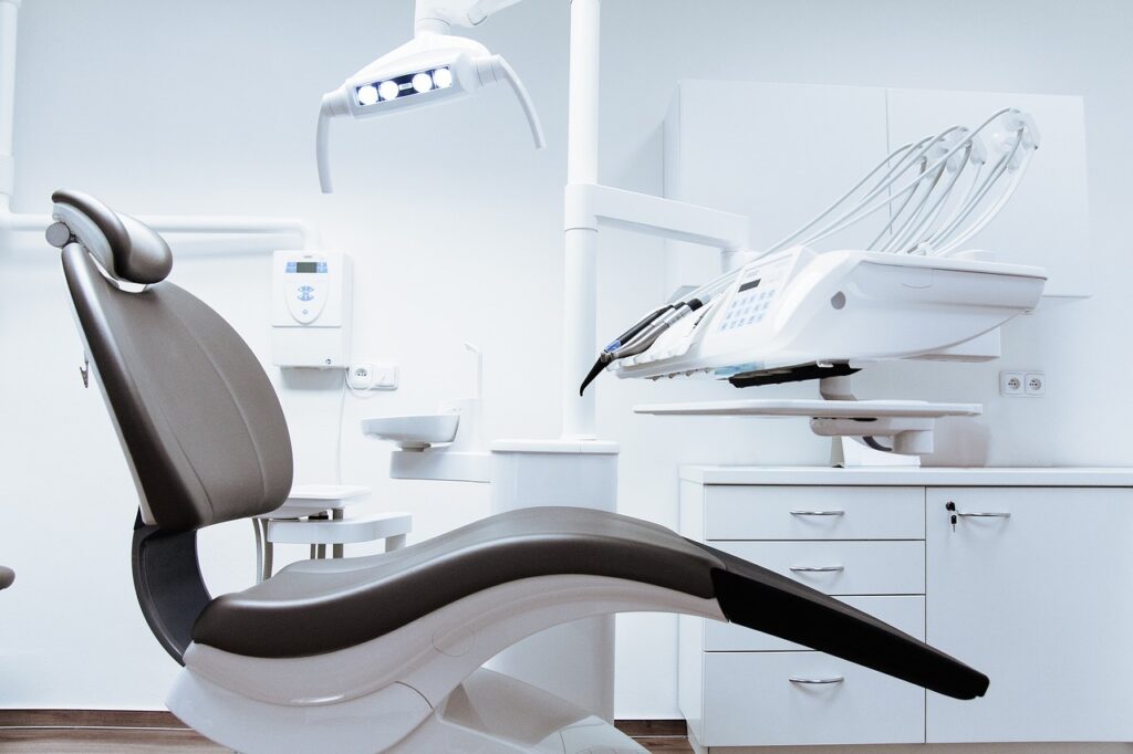 Modern dental chair and treatment room setup at OC Dental Center in Santa Ana, designed for patient comfort and high-quality dental care
